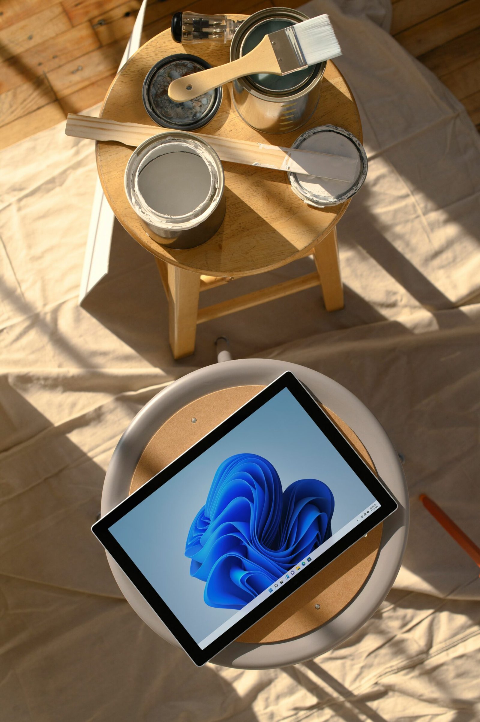 a tablet computer sitting on top of a wooden table